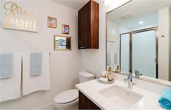 Bathroom with vanity and walk-in shower