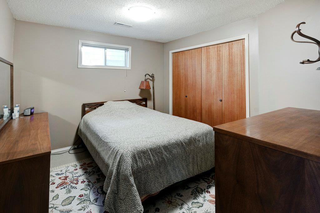Bedroom with a wide closet